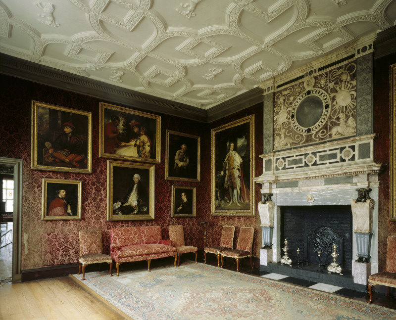 The interior of the Reynolds Room at Knole. It is also known as the Crimson Drawing Room due to the fact that its walls are hung with a rare early 18th Century crimson stamped woollen velvet. National Trust, Knole, Kent ©National Trust Images/Andreas von Einsiedel