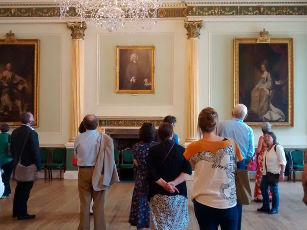 Attendees visit Bath’s Guildhall with portraits of George III and Queen Charlotte by the studio of Reynolds