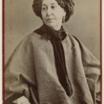 George Sand (Amandine-Aurore-Lucile Dupin, later Baroness Dudevant), by Nadar. Albumen carte-de-visite, 1866. 3 3/4 in. x 2 3/8 in. (95 mm x 60 mm). Purchased, 1959. NPG Ax17907. Currently on display in Room 22 on Floor 2 at the National Portrait Gallery.